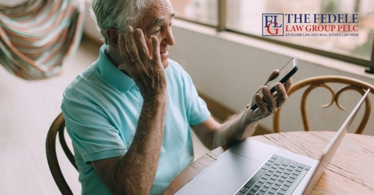 retiree looking at phone